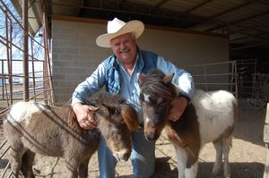 Tony Greaves with miniature horses at Little America Miniature Horses