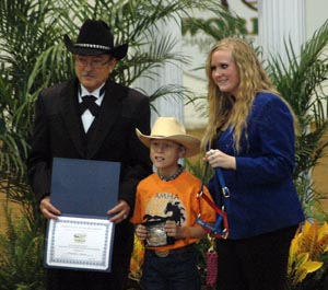 Kam winning high point boy 7 & under AMHA World 2010