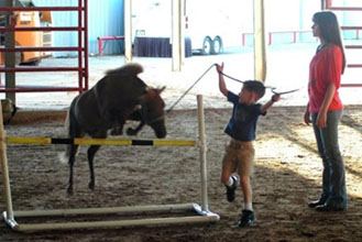 Michael learning to jump in Glen Rose 2012